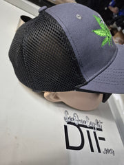 Rollin Lit green embroidered logo on gray and black six-panel trucker hat