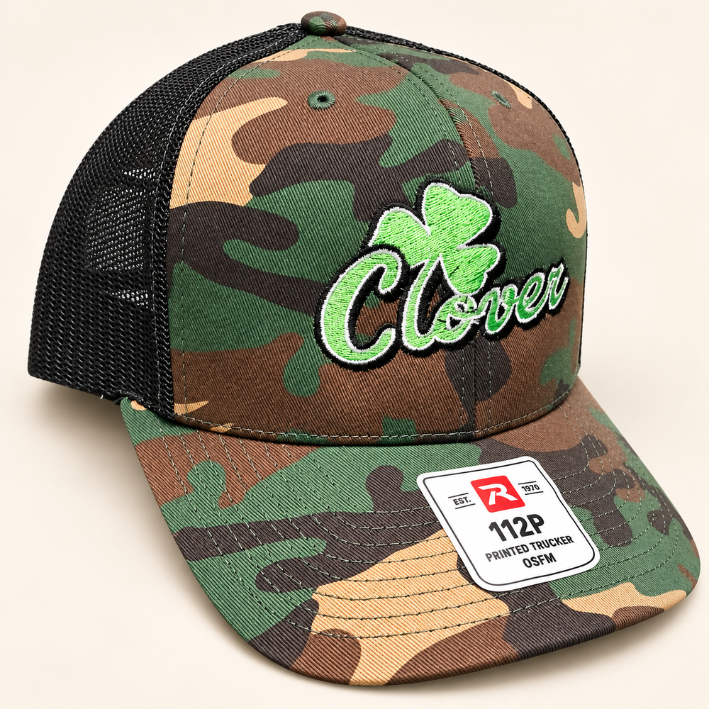Clover hat 1 Richardson 112P camo with black mesh and green Clover logo outlined in white and black