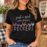 Woman wearing Just a Girl Who Loves Peckers chicken T-shirt