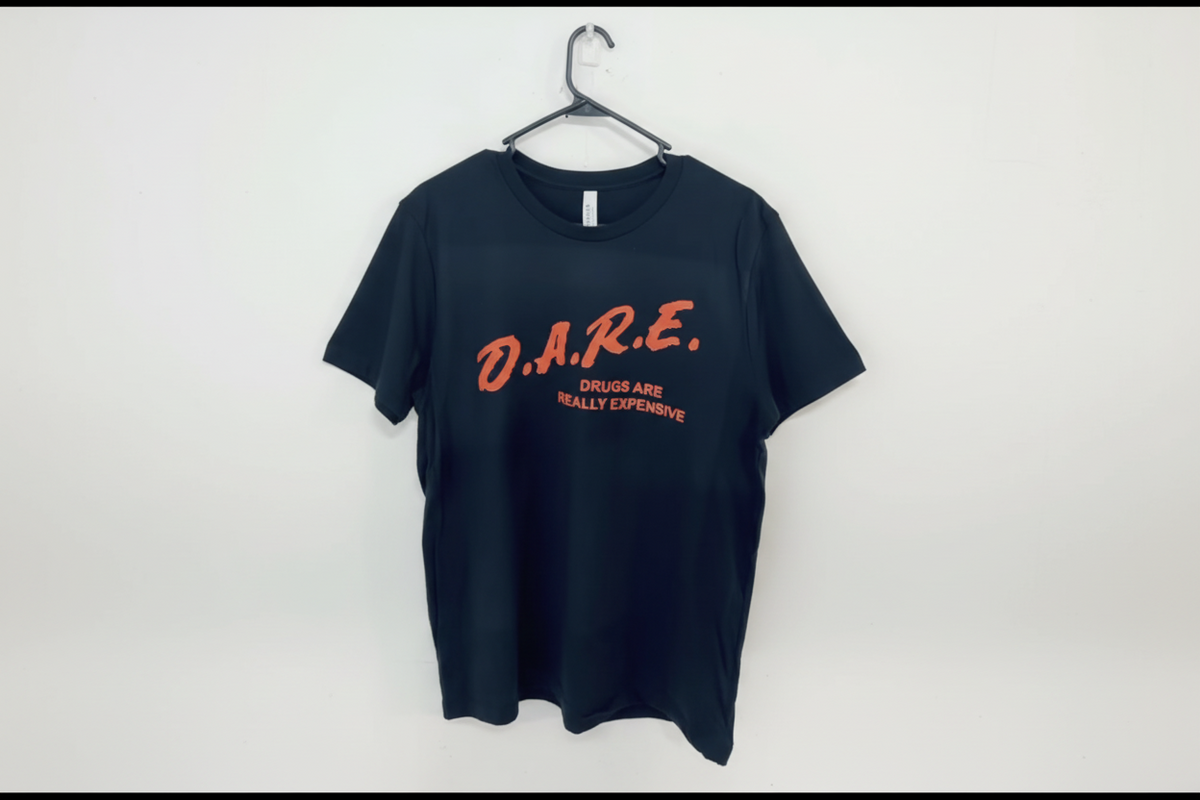 Navy blue t-shirt with red text 'D.A.R.E. Drugs Are Really Expensive' on a white background